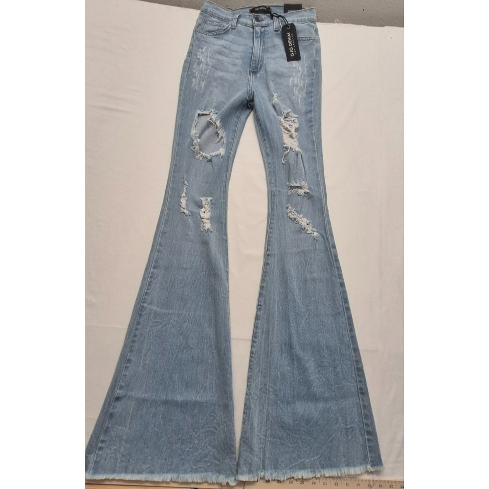 NWT GJG women's distressed flare leg light‎ wash Denim blue Jeans sz. 7 USA